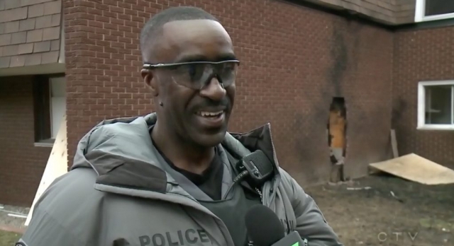 OPS officer Paul Burnett happily discusses the bombing of empty townhouses after Hazelview's first wave of demovictions with CTV News.